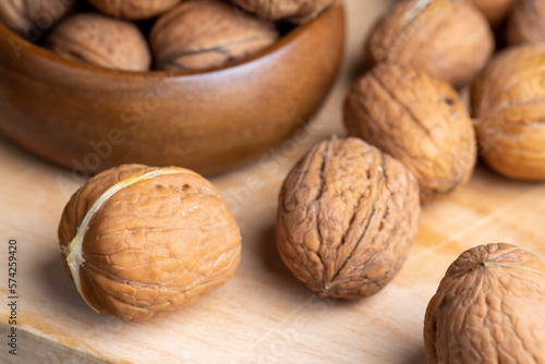 Unpeeled walnut harvest on the table