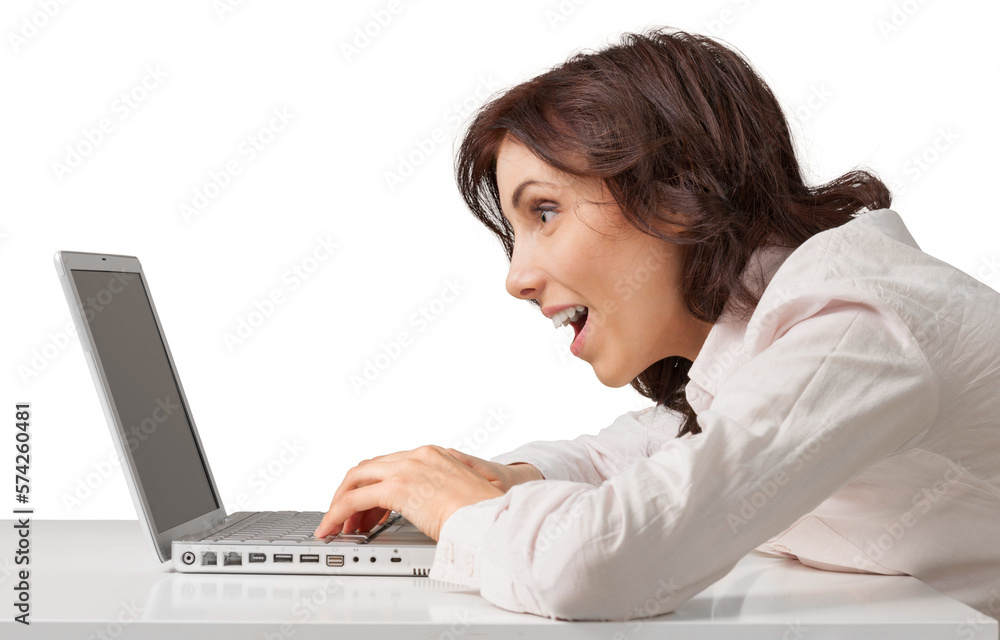 Shocked Businesswoman Using a Laptop - Isolated Shocked Businesswoman Using a Laptop - Isolated
