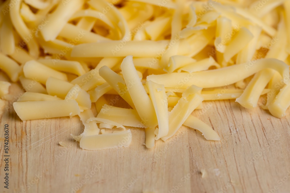 Sliced and grated hard cheese with cashew nuts Sliced and grated hard cheese with cashew nuts
