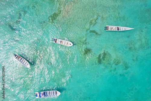 Boats at the beautiful caribbean beach of Capurgana photo