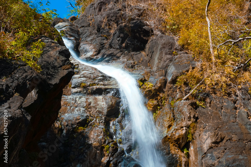 hidden waterfall and rock formation photo