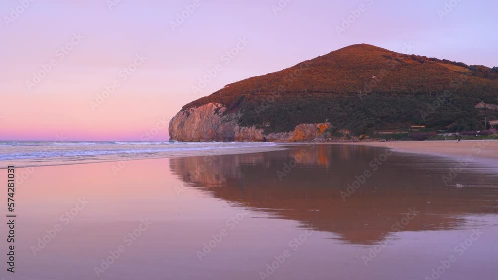 Landscape at sunset on the beach of Berria near the town of Santoña. Natural Park of the Marshes of Santoña, Victoria, Noja and Joyel. Cantabrian Sea. Cantabria. Spain. Europe Landscape at sunset on the beach of Berria near the town of Santoña. Natural Park of the Marshes of Santoña, Victoria, Noja and Joyel. Cantabrian Sea. Cantabria. Spain. Europe