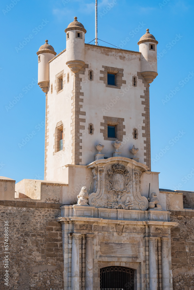 Detail of the tower and portal of the Puerta de Tierra wall that divides the medieval and modern areas of Cádiz, SPAIN