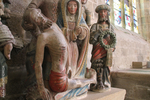 sculpture (lamentation of christ) in the pénity chapel in locronan in brittany (france) photo