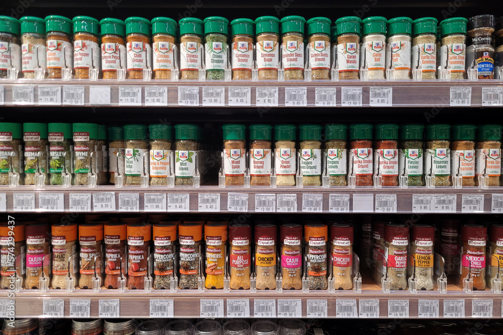 PENANG, MALAYSIA 22 FEB 2023 Various brand of food seasonings, herbs and spices on store