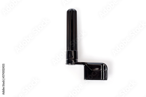 Принти на полотні Plastic guitar string winders in black, shot on a white background