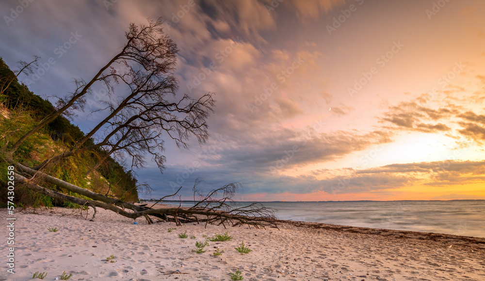 Sunset by the sea. Nature and nature landscape at sunset.