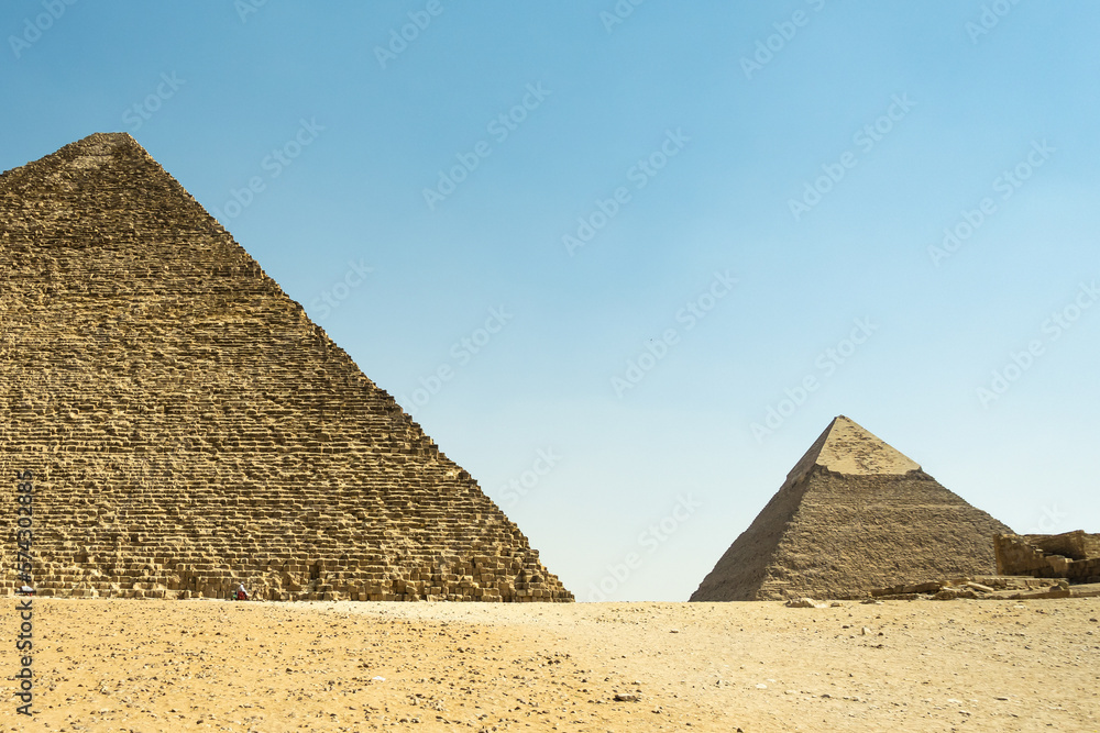 Pyramids of Giza. Pyramid of Cheops and Pyramid of Chephren side by side in perspective.
Sights in Giza near Cairo in Egypt Pyramids of Giza. Pyramid of Cheops and Pyramid of Chephren side by side in perspective.
Sights in Giza near Cairo in Egypt