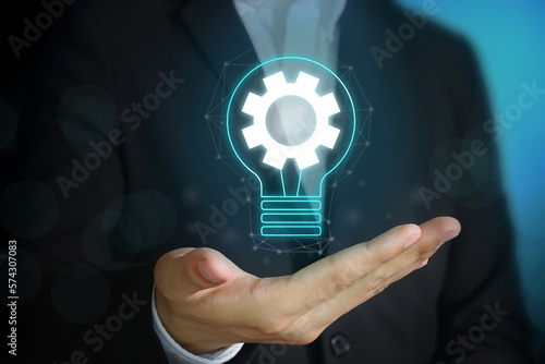 Concept idea of Innovation. Hands holding light bulb for new idea concept with innovation and inspiration, innovative future technology and communication concept