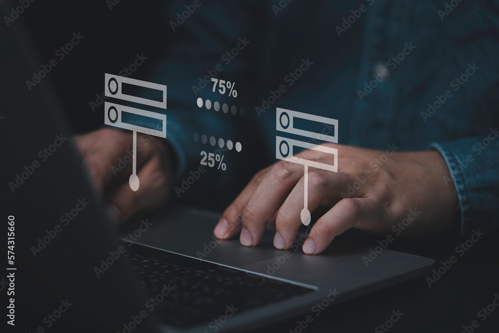 Businessman hand using laptop computer with data host server storage icon for information exchange and transfer concept. Businessman hand using laptop computer with data host server storage icon for information exchange and transfer concept.