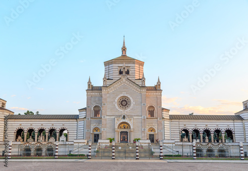 Milan, Italy - July 7, 2019: Monumental cemetery (Italian: Cimitero Monumentale di Milano). One of the richest tombstones and monuments in Europe photo
