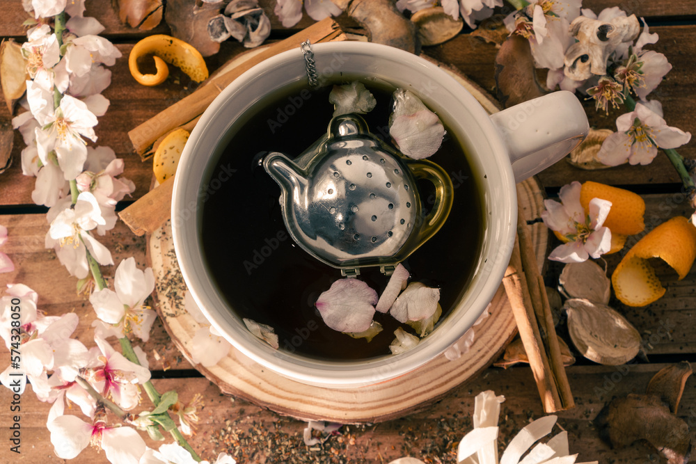 Fototapeta premium top view infusion or tea of aromatic herbs, flowers and fruits