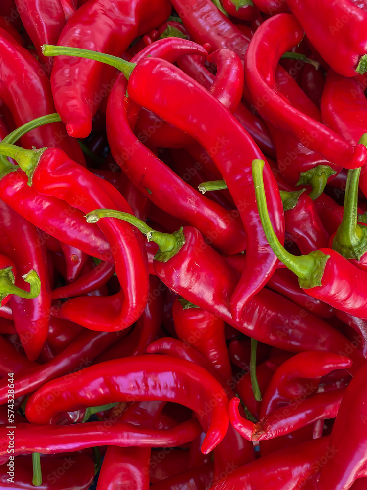 lots of red hot pepper seasoning to food as background lots of red hot pepper seasoning to food as background