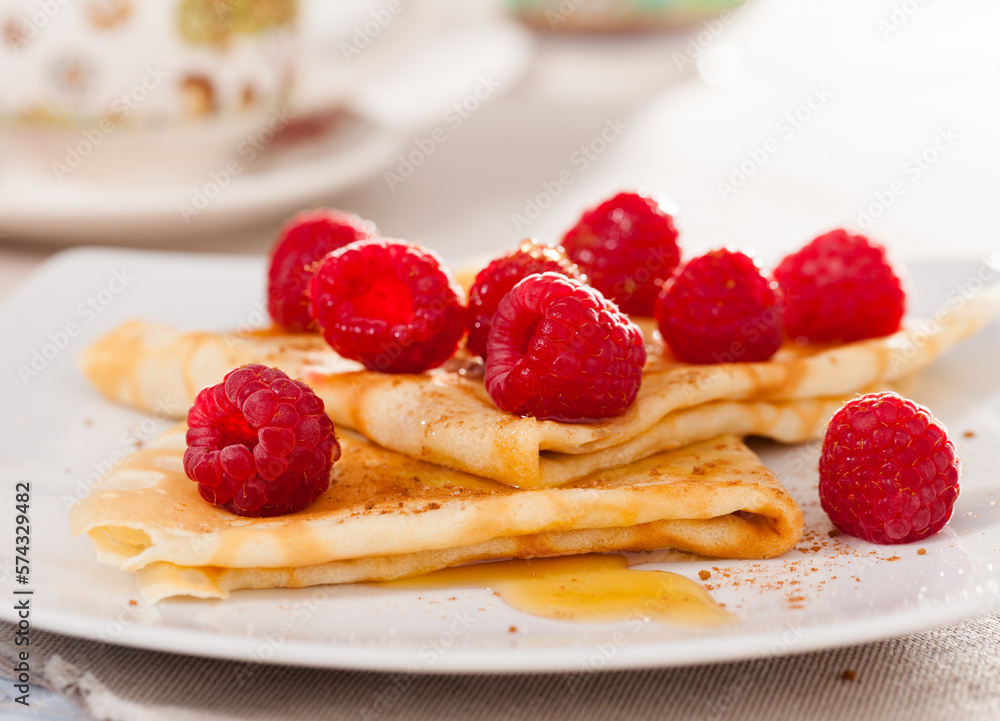 delicious pancakes with fresh raspberries and honey delicious pancakes with fresh raspberries and honey