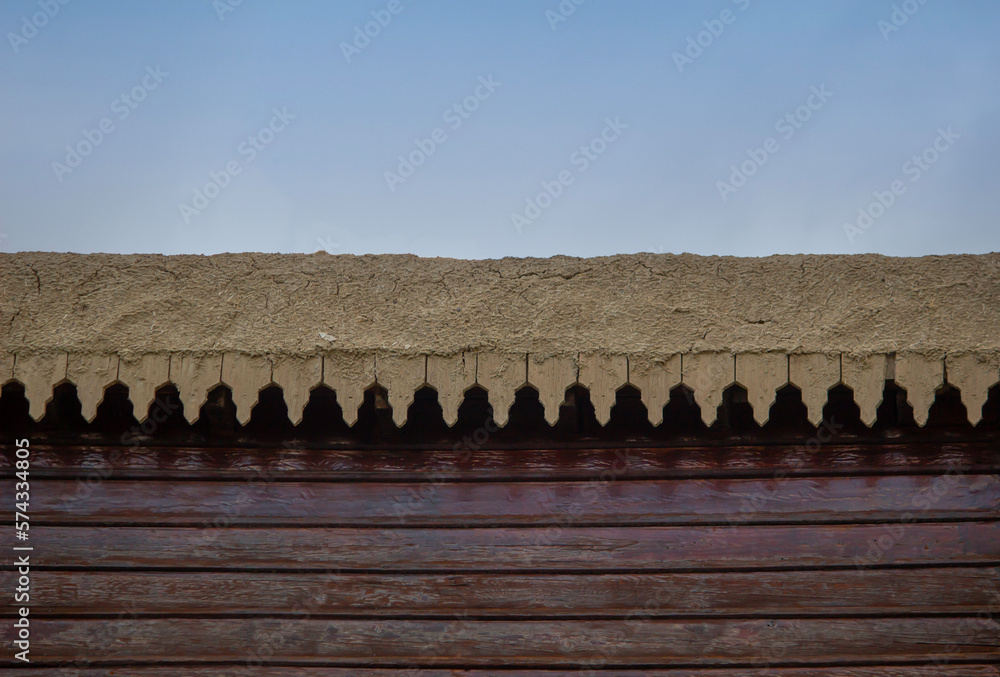 earthen roof and edge decorations of an old wooden house. turkish and ottoman style.