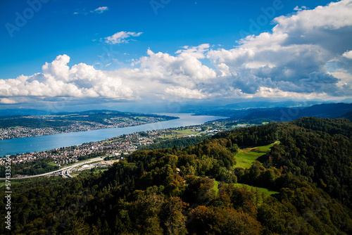 Zurich, view from Uetliberg in September; city seen from above with forest in the foreground, birds eye view on Zurich, the panaromic view of the city Zurich, european capital city.