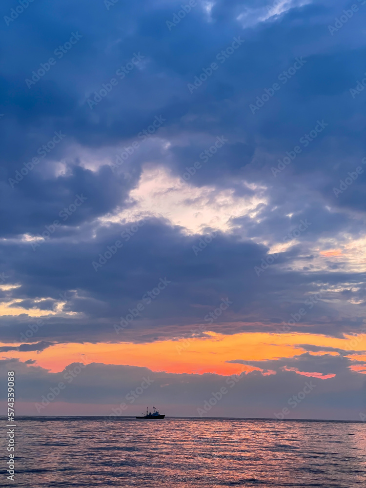 beautiful sea sunset on the sea with sky with clouds boat trip