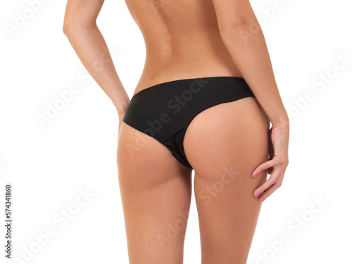 slender woman in swimsuit on white background