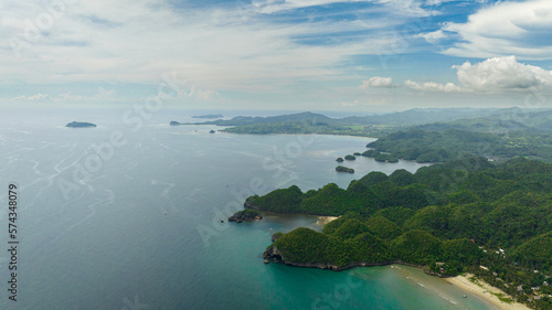 The coast of the island with tropical vegetation and the beach. Negros, Philippines.
