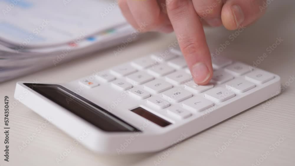 close up shoot of a male hand doing some calculations 4k slow motion close up shoot of a male hand doing some calculations 4k slow motion