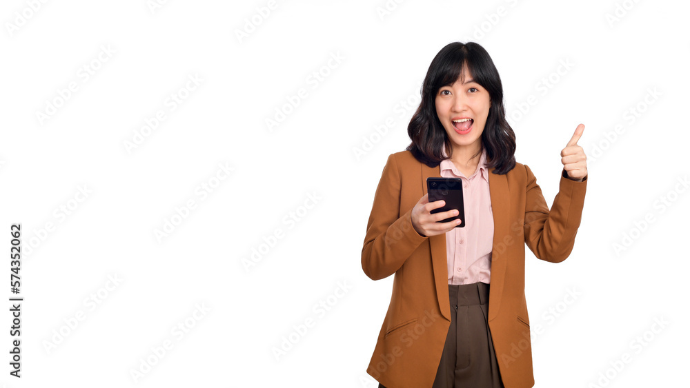 Surprised beautiful young Asian lady using mobile phone with positive expression, smiles broadly, dressed in casual clothing on white background. Happy adorable glad woman rejoices success Surprised beautiful young Asian lady using mobile phone with positive expression, smiles broadly, dressed in casual clothing on white background. Happy adorable glad woman rejoices success