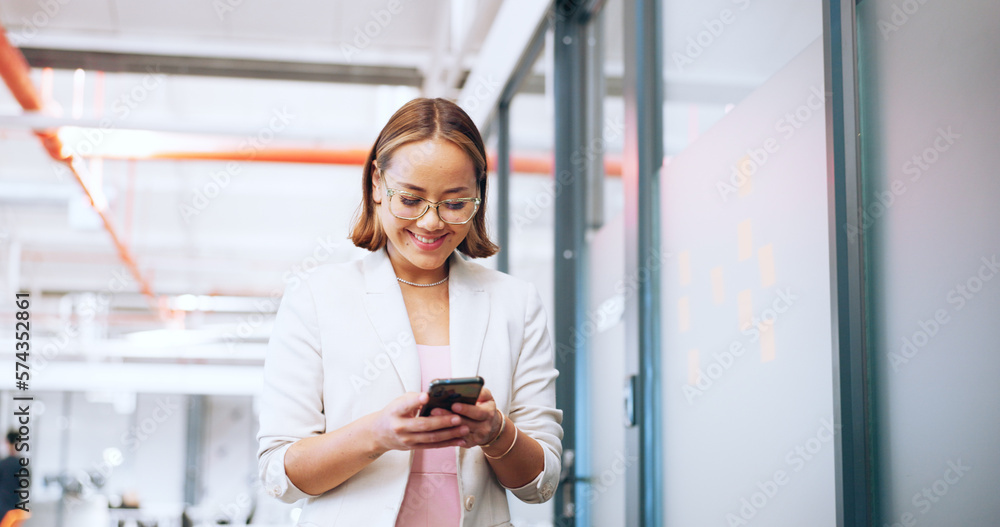Business woman, office phone and communication of a employee walking with a smile. Corporate worker on technology for social media, web and internet scroll at work with happy texting on a break Business woman, office phone and communication of a employee walking with a smile. Corporate worker on technology for social media, web and internet scroll at work with happy texting on a break