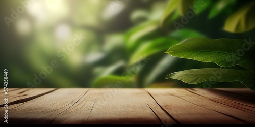 Empty wooden surface with blurred rainforest on background. Product background