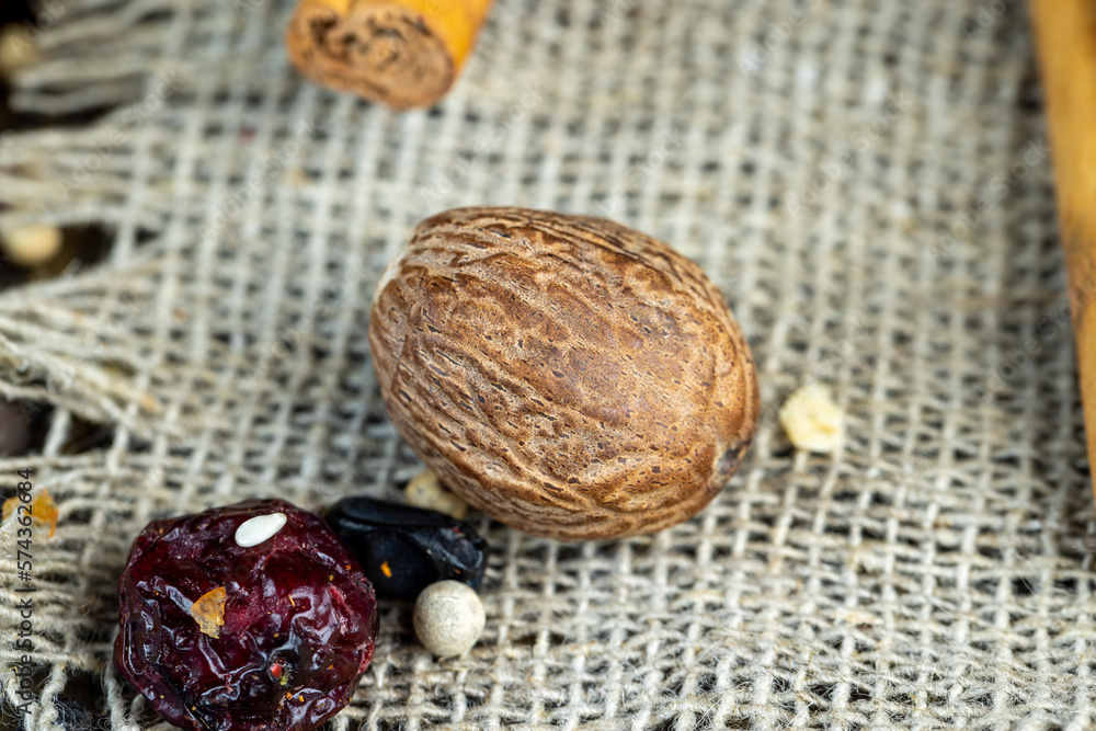 nutmeg and other spices mixed on the table nutmeg and other spices mixed on the table