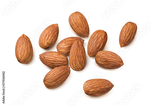 Scattered almond nuts isolated on white background