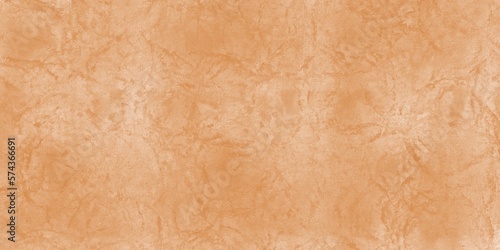 Textured background of old raw cement or orange plaster wall with stains and cracks