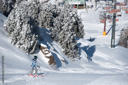 Unrecognized young person doing skiing at snow. Winter athletic sports. Troodos mountains Cyprus photo