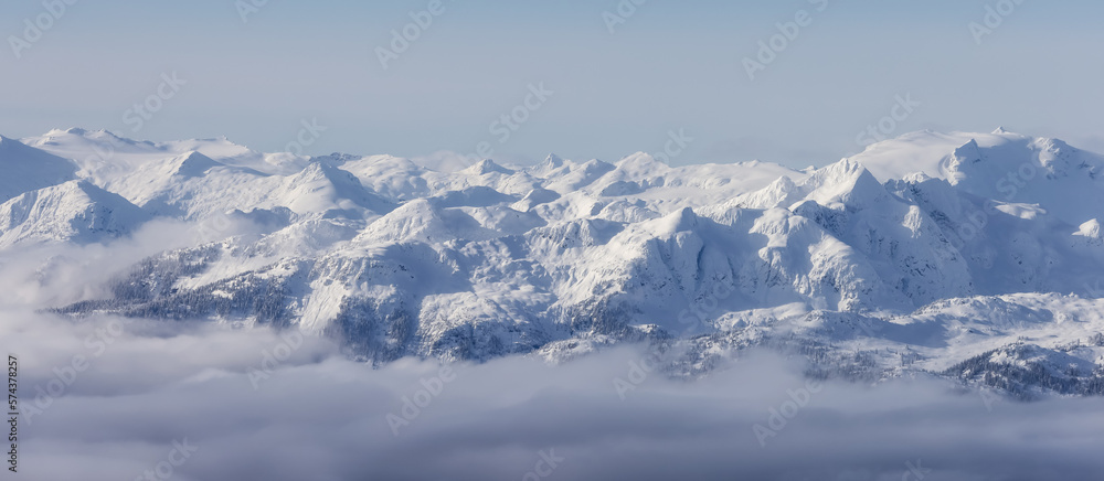 Snow and Cloud covered Canadian Nature Landscape Background. Winter Season in Whistler, British Columbia, Canada. From Blackcomb Mountain