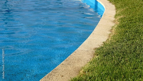 edge of a pool with grass floor © Esteve