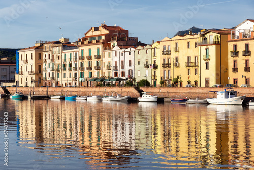 River with Homes and Apartments in Touristic Town. Bosa  Sardinia  Italy. Sunny Fall Season Day. Panorama
