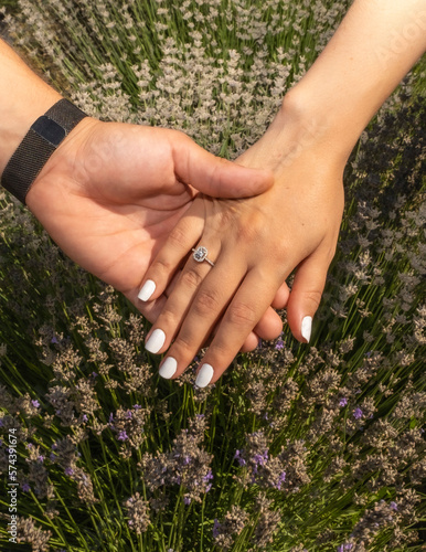 hands of the groom and bride