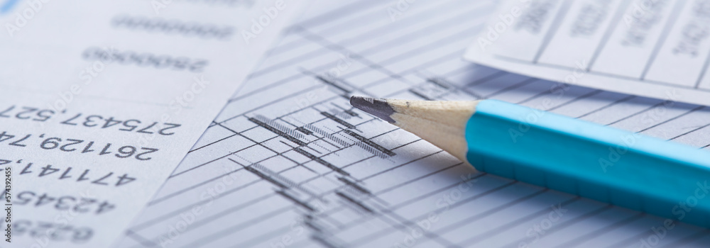 Checking the value of securities. Pencil, share listing and checking financial chart. Concept of banking, financial report and financial audit. Checking the value of securities. Pencil, share listing and checking financial chart. Concept of banking, financial report and financial audit.