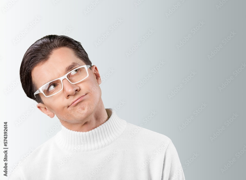 Happy young handsome man thinking idea Happy young handsome man thinking idea