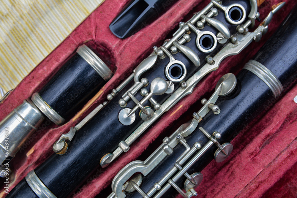 Naklejka premium Disassembled clarinet in its case .