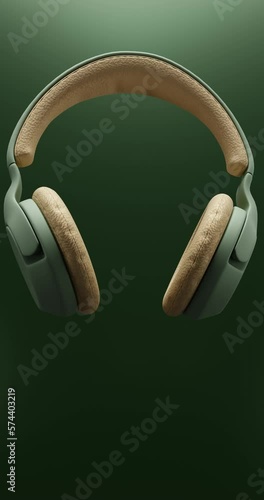 Wireless headphones isolated on green background 3d illustration render 360 degrees looped rotation.