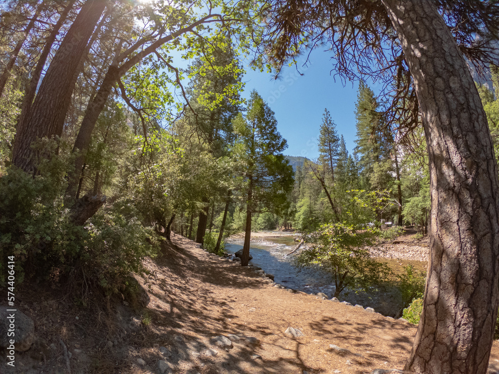 The Merced River threads through Yosemite National Park in a stretch popular for boating and whitewater rafting, in California, USA. The Merced River threads through Yosemite National Park in a stretch popular for boating and whitewater rafting, in California, USA.
