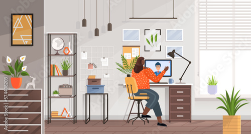 Home office concept. Freelancer woman working on computer at her house. Online study, education, remote work, freelancing, teaching, e-learning and video conferencing. Person sitting on chair at desk