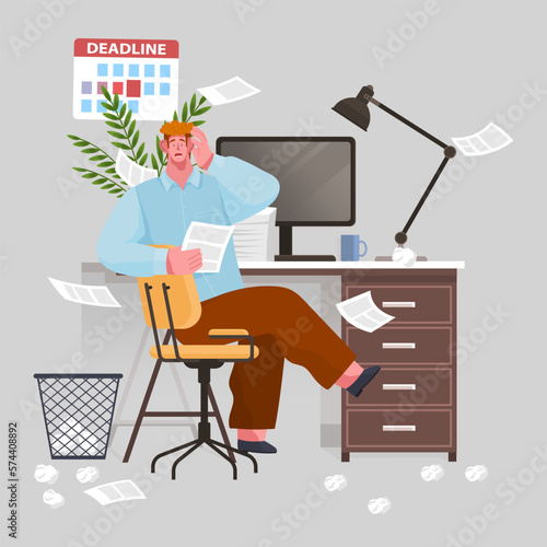 Confusion and mess. Stressed man office worker spreading papers. Tired confused worker sits at table and scaredly holding his hand over his head. Home office workplace with computer and chaos