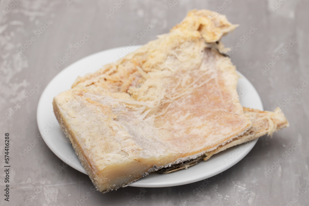 salted cod fish on white small dish salted cod fish on white small dish