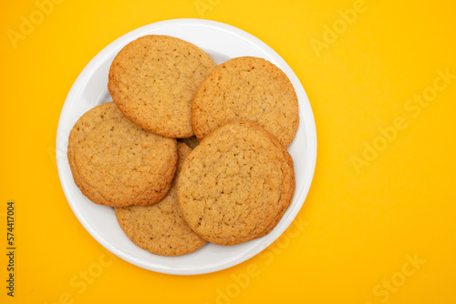 Few homemade cookies on white small dish
