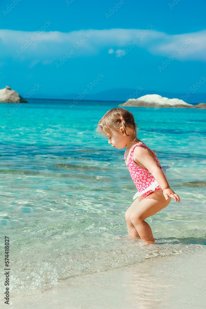 happy child playing by the sea happy child playing by the sea