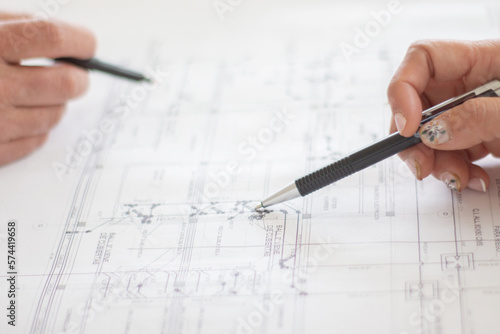 Architect, Engineer, drawing up plumbing and drainage blueprints