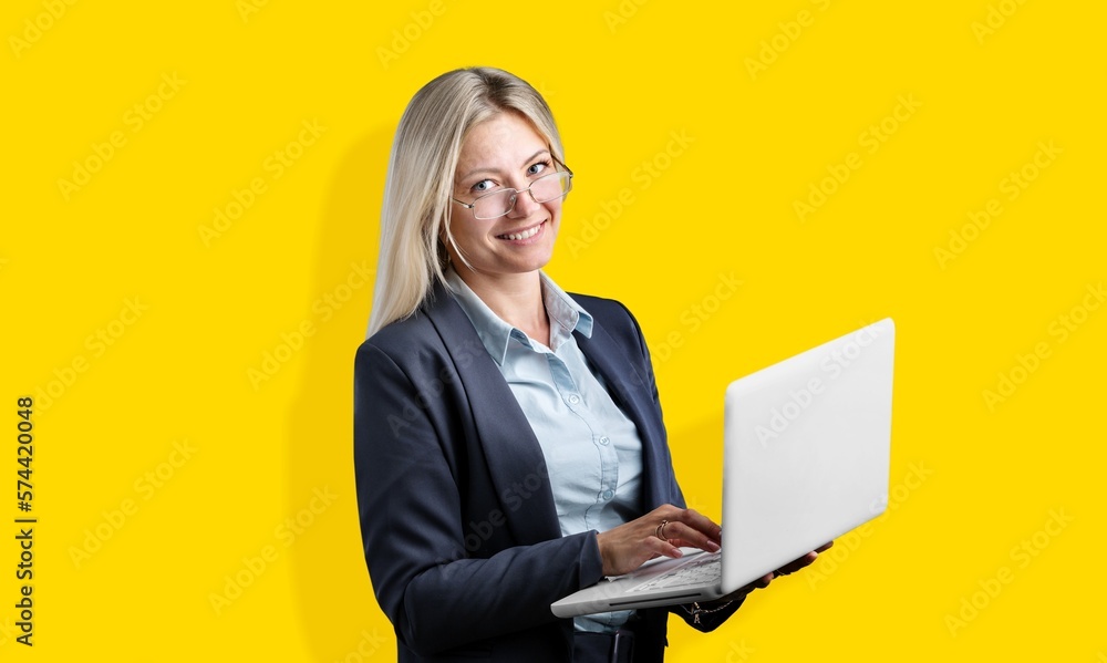 Happy business woman working with laptop Happy business woman working with laptop