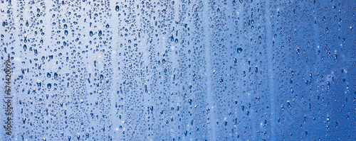 water drops on a window or in the shower cabin,wet transparent panorama background