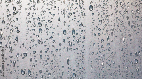 water drops on a window or in the shower cabin,wet transparent panorama background