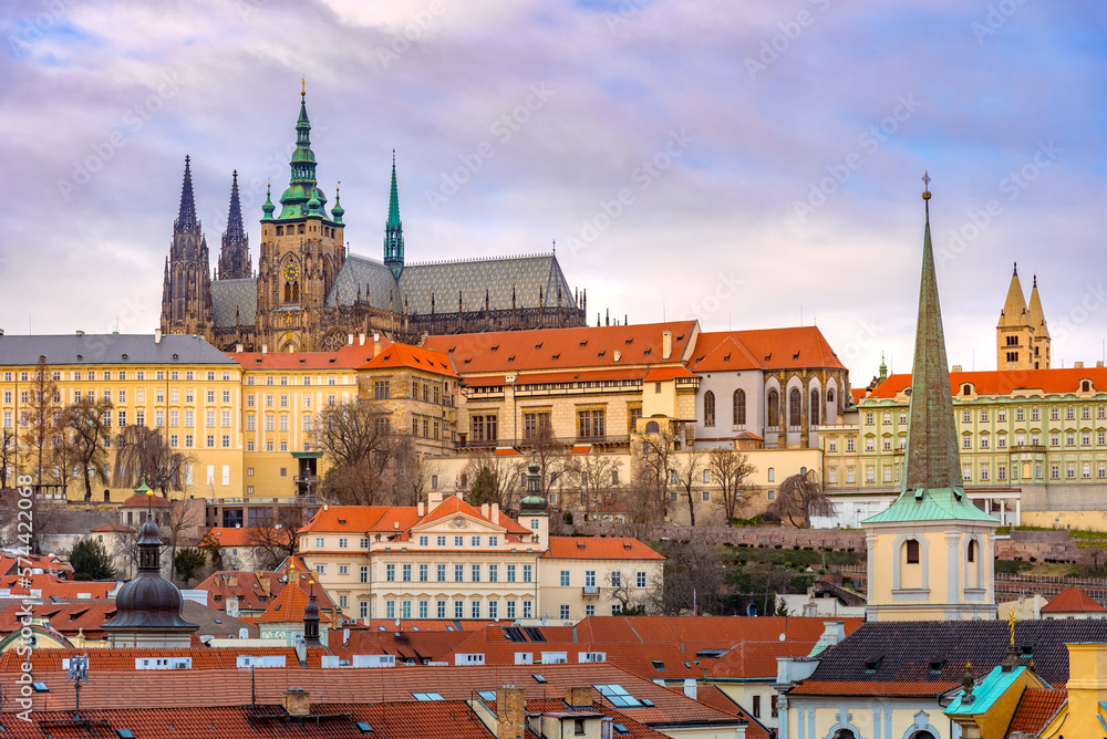 Obraz premium Cityscape of Prague with medieval towers and colorful buildings, Czech Republic